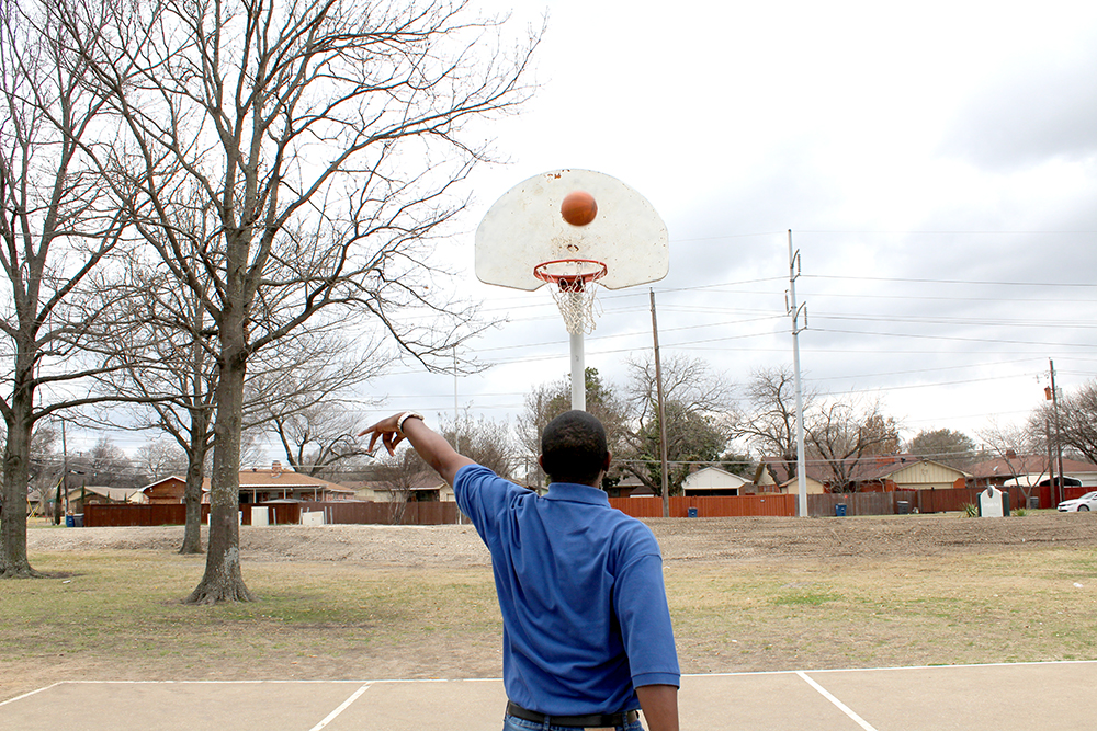 Dallas native, Dwayne Morgan, shoots a basketball Tuesday, March 9, 2021 at Everglade Park in Dallas. 