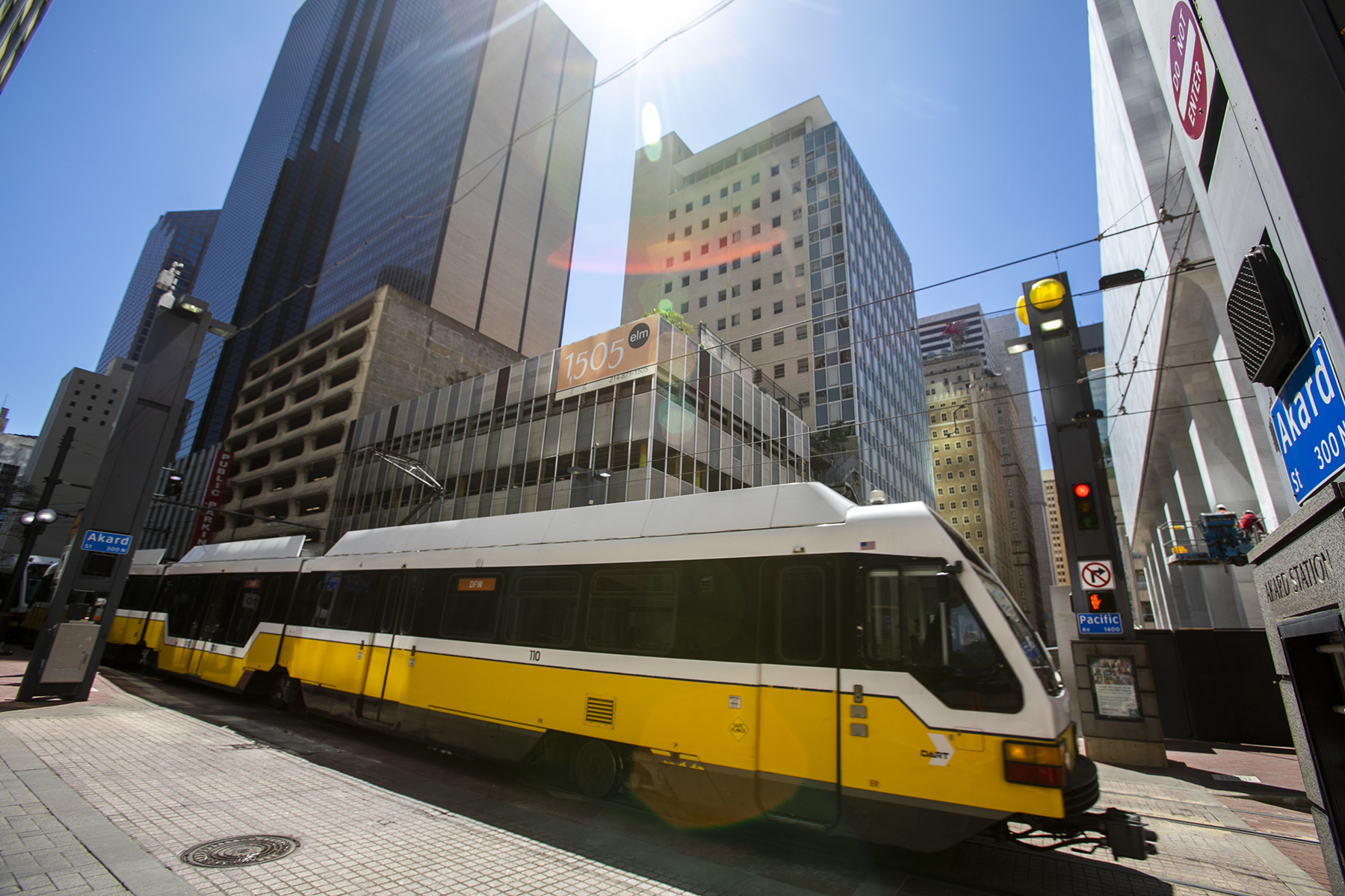 DART light rail vehicle approaches Akard Station in Dallas.